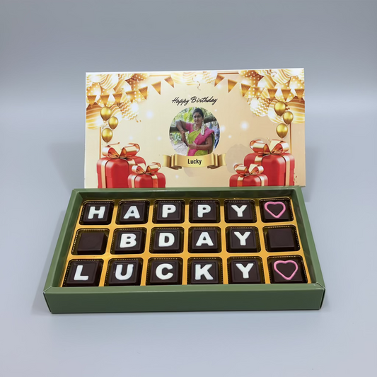 Chocolate box with 'Happy Birthday Lucky' message on a decorative card